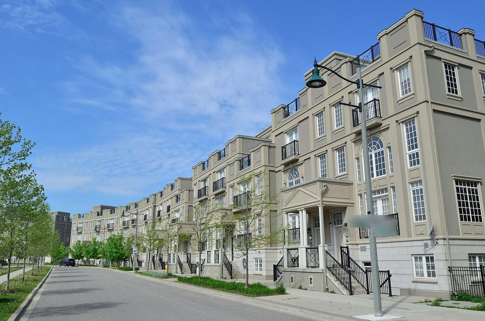 A street of stone-trimmed townhouses in Downtown Markham